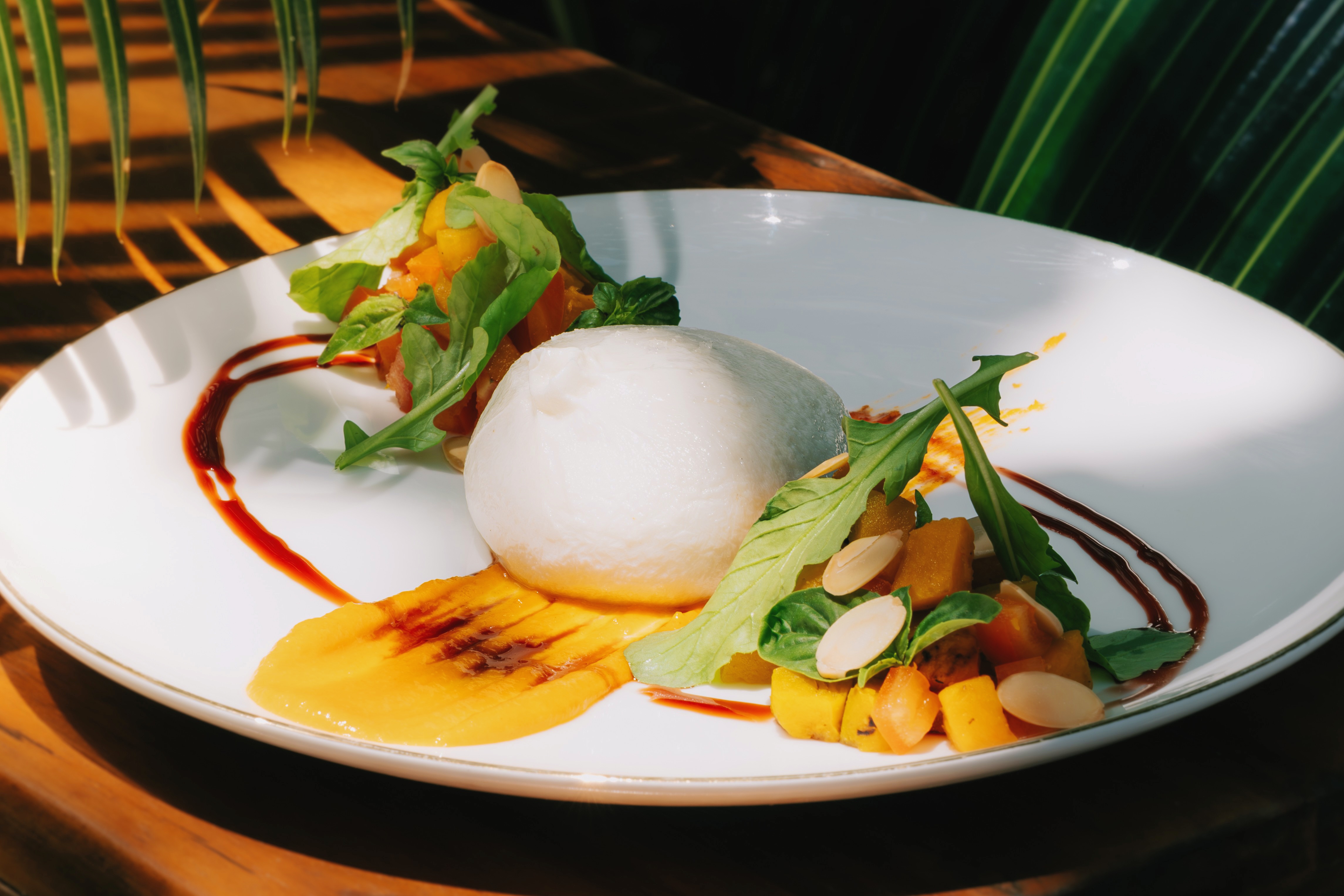 Burrata dish served at Trogon’s Perch