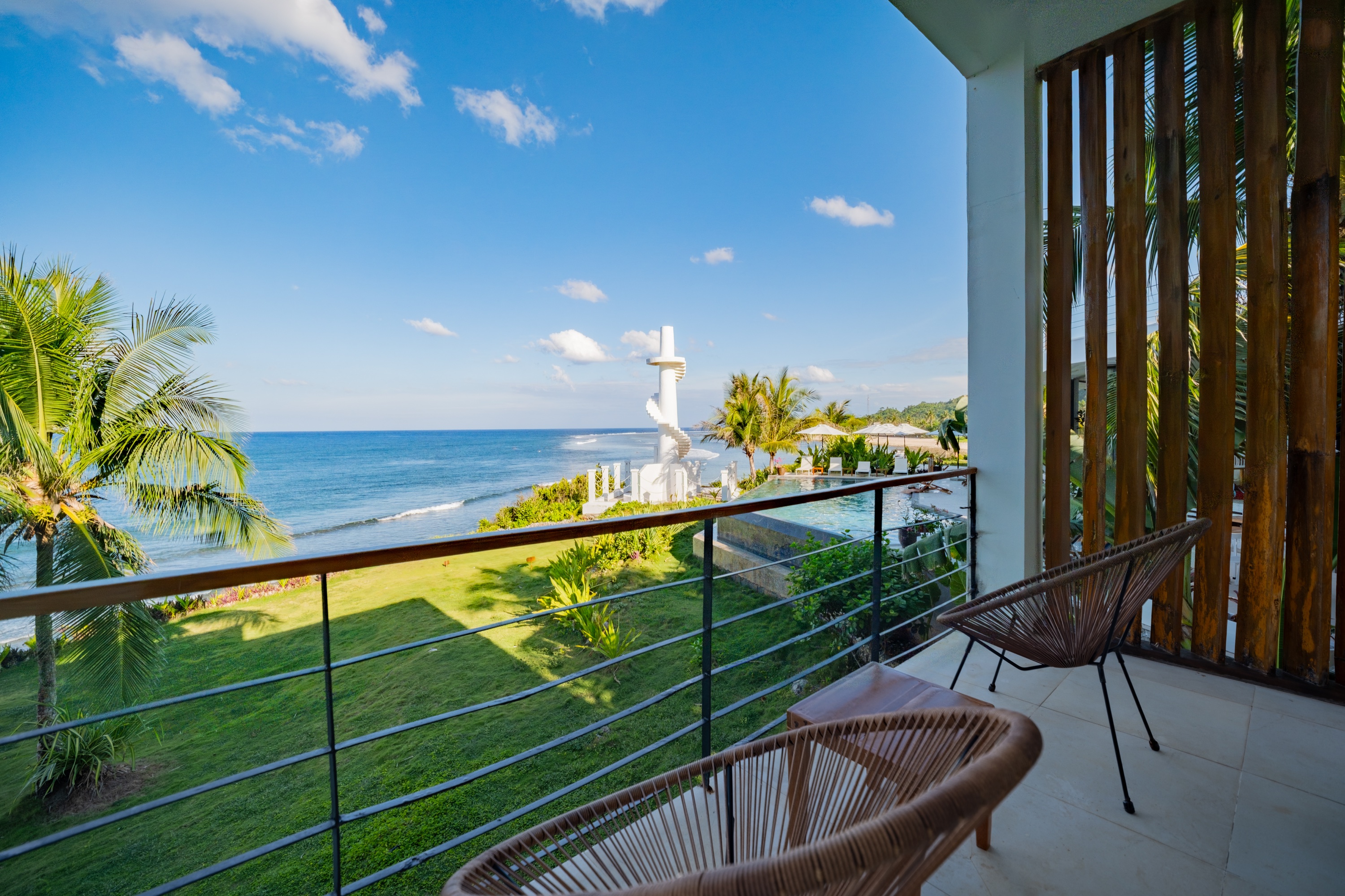 Private balcony overlooking the Pacific, gardens and landmark sculpture