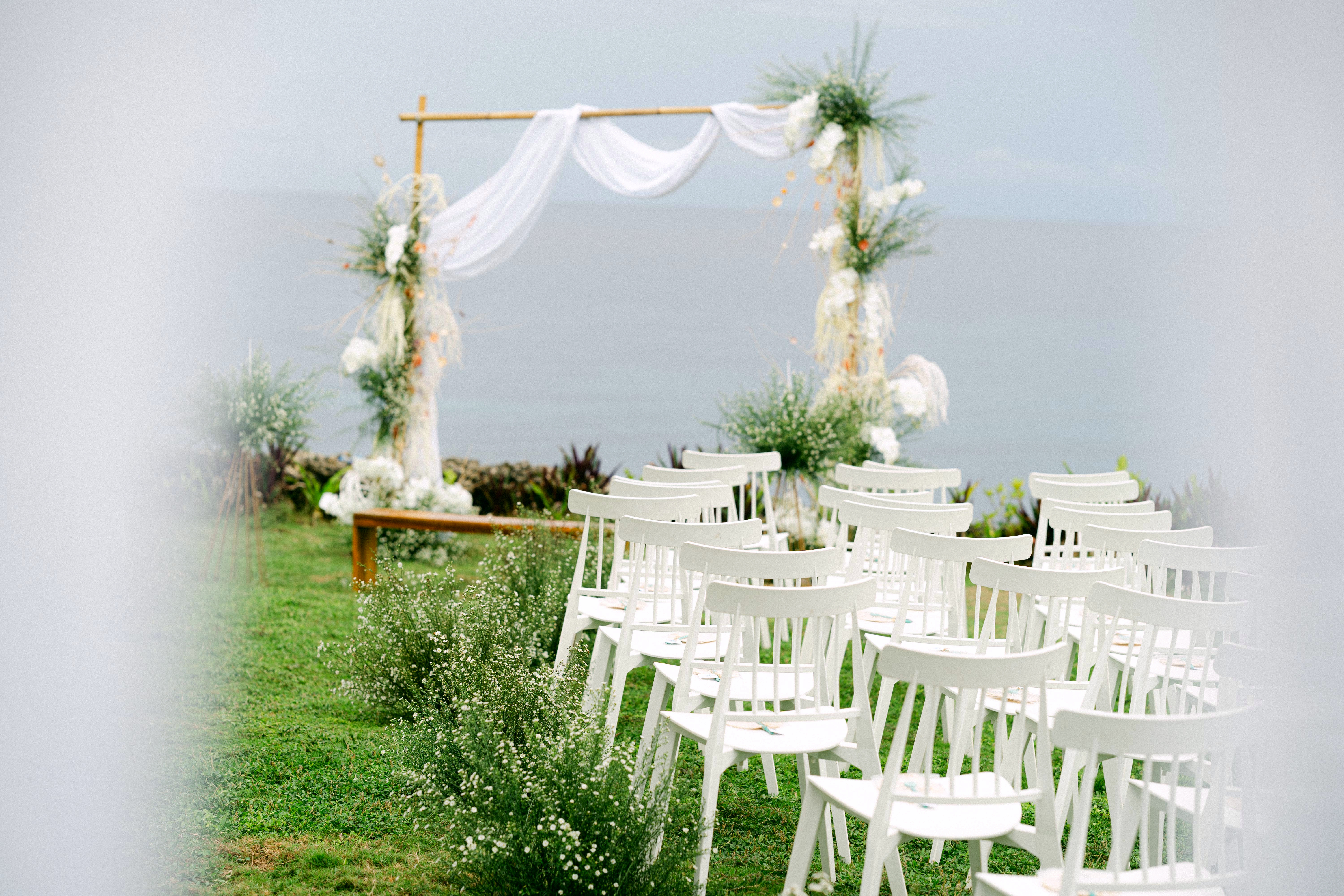 Seaside wedding aisle and ceremony chairs
